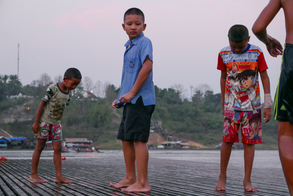 Mon kids during a football game on a floating platform, Sangkhlaburi, Thailand (photo by Irina Stelea)